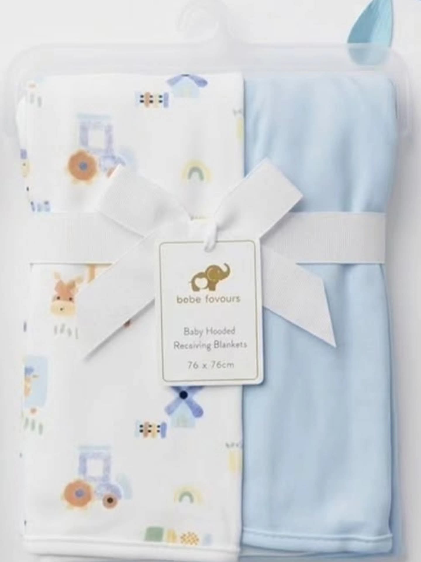 Hooded swaddle old house